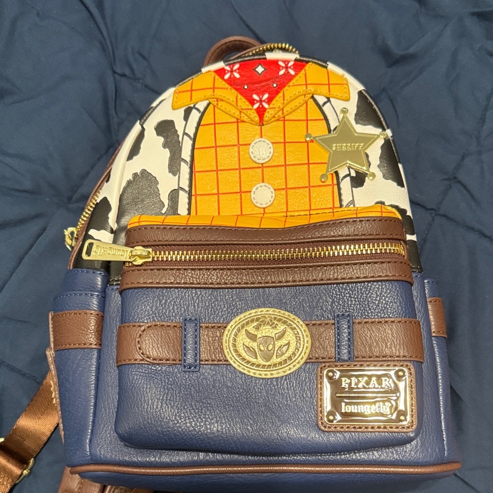 Loungefly Pixar Woody-Inspired Backpack with Blue and Brown Accents
